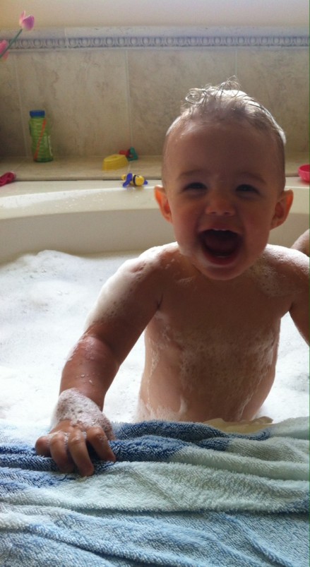 Baby laughing in the tub