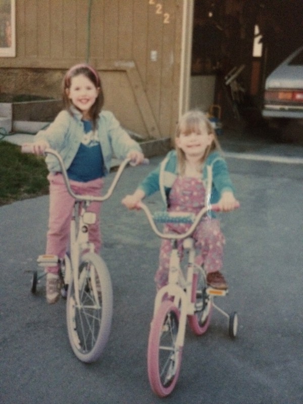 Jessica and Chelsea on bikes in Alaska